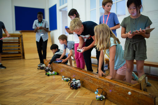 Children play with robots they have made